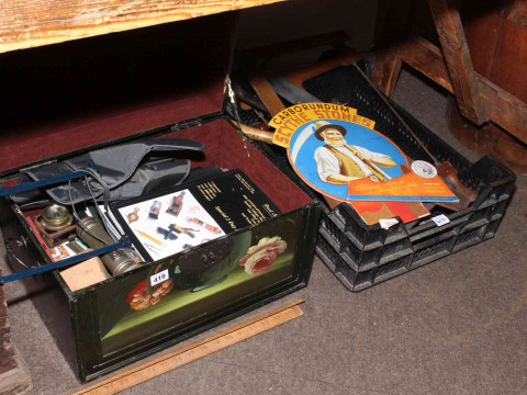 Three boxes of tools including levels, saws and tool auction catalogues. thumbnail