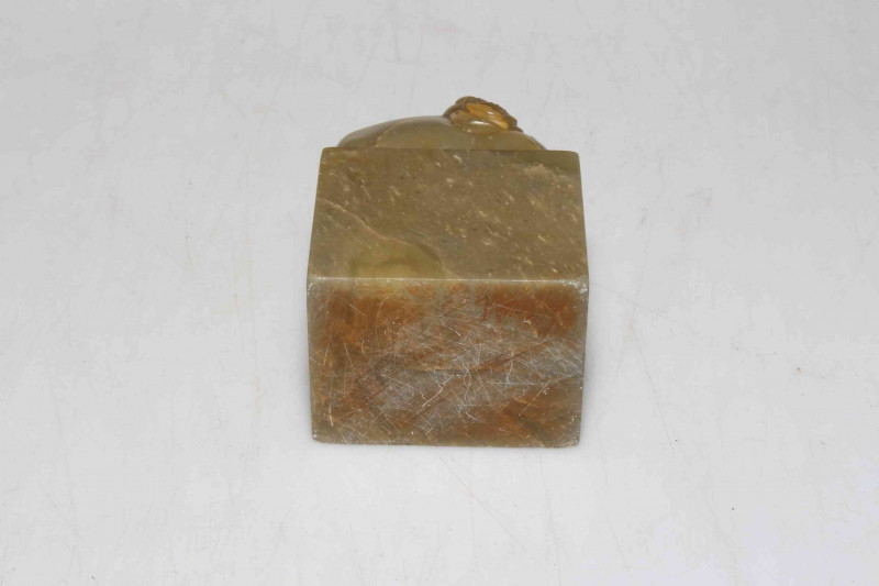 Chinese soapstone/marble carving of figure on water buffalo, 8cm.