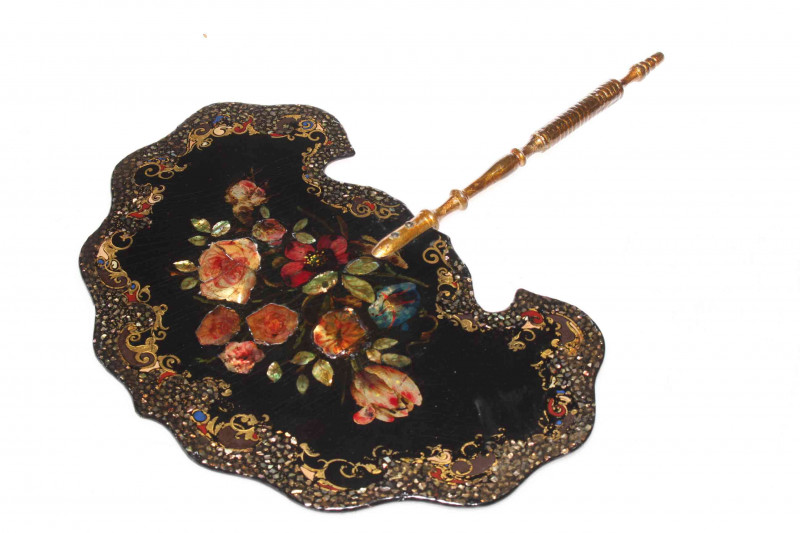Victorian papier-mache face screen with floral and gilt decoration, 29cm across.