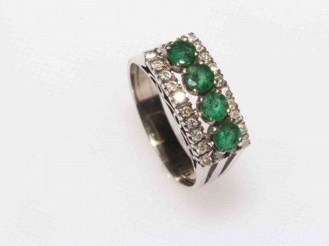 Emerald and diamond cluster 14k white gold ring, having four emerald row...