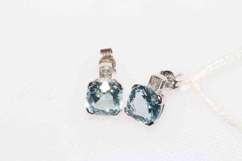 Pair blue topaz earrings set in 9 carat white gold.