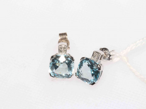 Pair blue topaz earrings set in 9 carat white gold.
