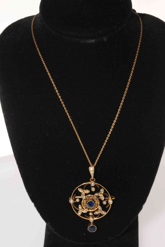 9 carat gold, sapphire and seed pearl pendant brooch with fine chain.