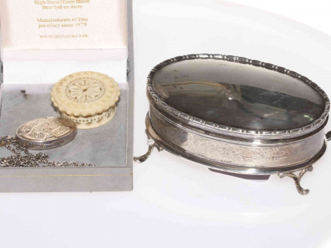Silver oval ring box, London 1909 (lid loose), silver locket and small...