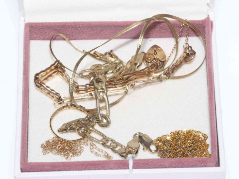 9 carat gold chains, gate bracelet and ring, and another bracelet.