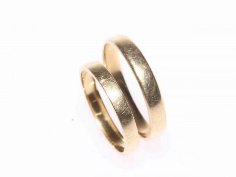 Two 14 carat gold wedding rings.
