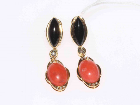 Coral and onyx pendant earrings set in 18 carat gold.