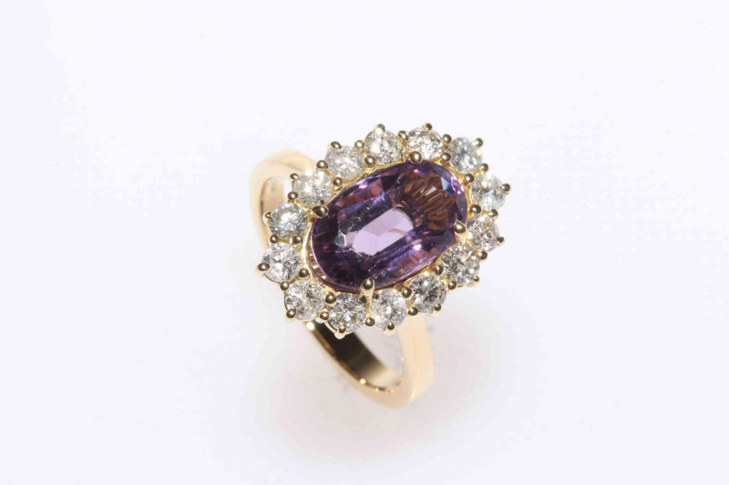 Amethyst and diamond 18 carat gold cluster ring, with 3 carat amethyst, size N.