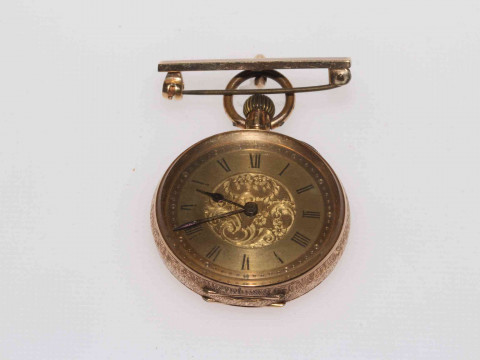 14k gold keyless fob watch with 9 carat gold bar brooch.