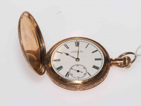 Waltham keyless hunter in ornate decorated case.