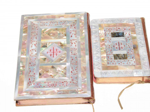 Two ornate mother of pearl veneered New Testament books, largest 16cm by 11cm. thumbnail