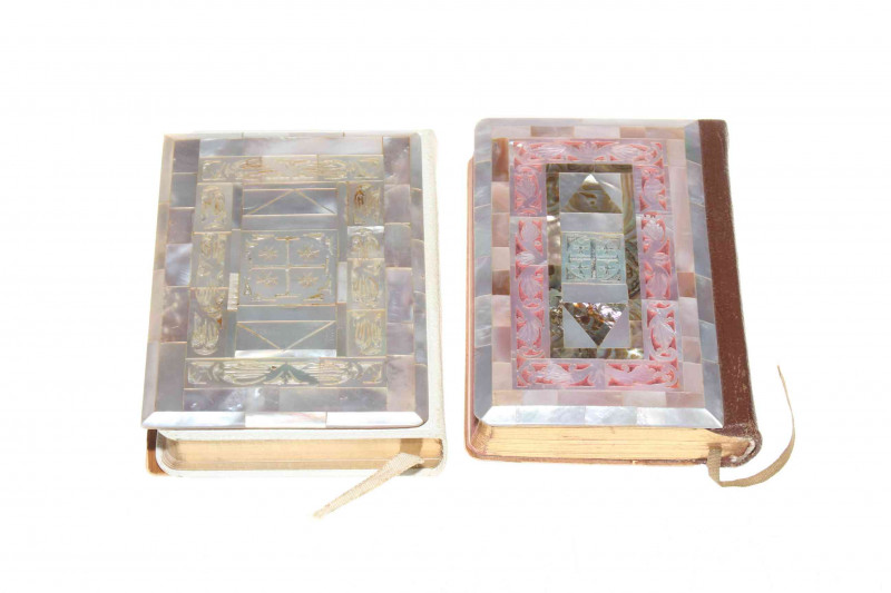 Two ornate mother of pearl veneered Prayer books, largest 12cm by 8.5cm.