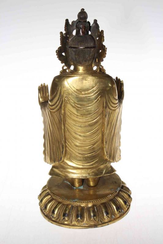 Tibetan gilt bronze Bodhisattva, standing with arms and palms forward, 33cm.