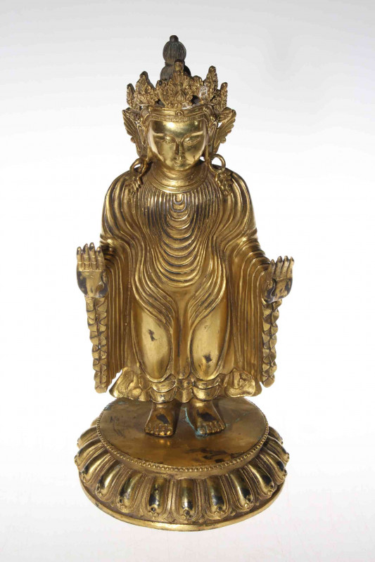 Tibetan gilt bronze Bodhisattva, standing with arms and palms forward, 33cm.