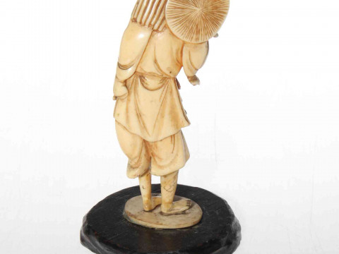 Japanese ivory figure of a wood cutter, circa 1900, 16cm. thumbnail