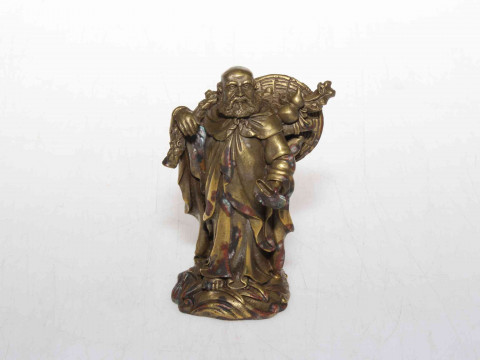 Chinese gilt bronze travelling elder, 9.5cm.