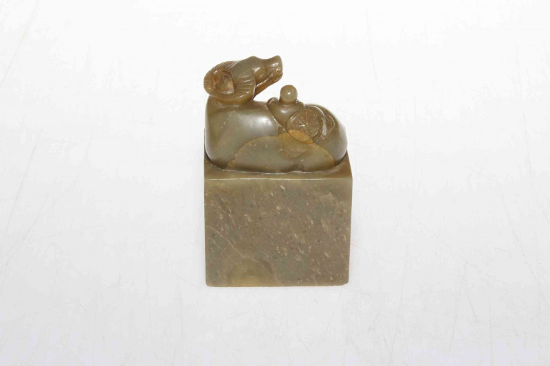 Chinese soapstone/marble carving of figure on water buffalo, 8cm.