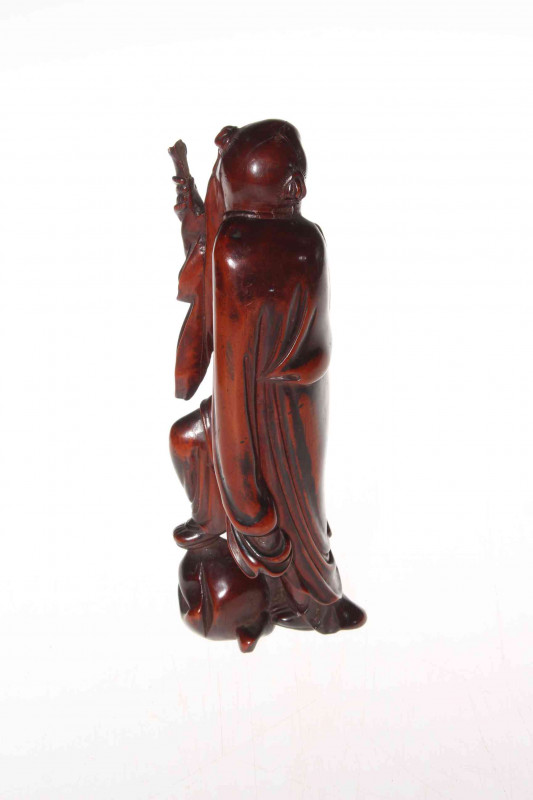 Carved wood Oriental figure of a sage.