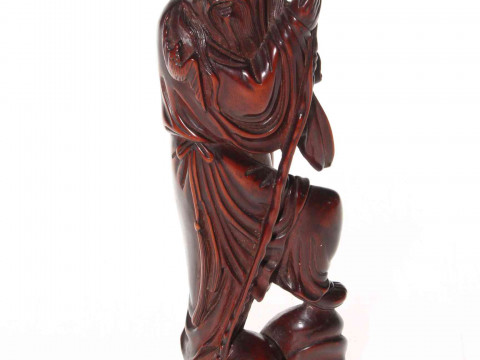 Carved wood Oriental figure of a sage.