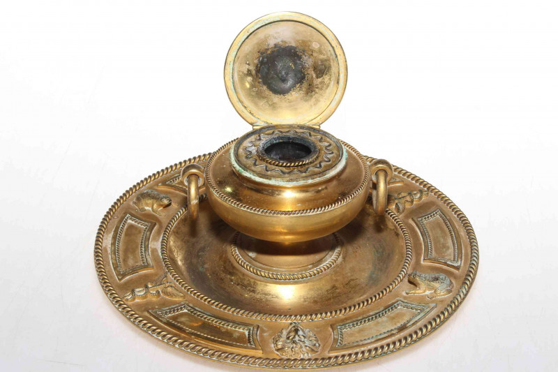 French 19th Century gilt desk inkwell with rope twist borders, 20cm diameter.