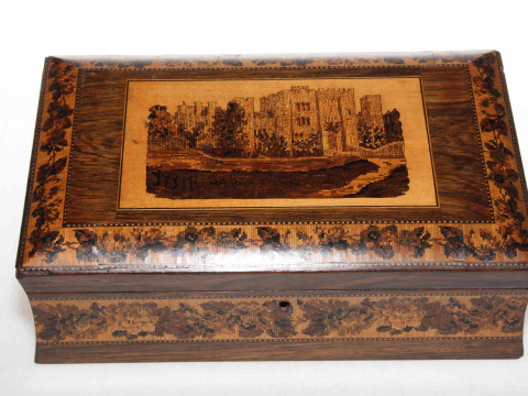 19th Century Tunbridge ware box, having castle decoration to lid with foliate borders on rosewood, 25cm across. thumbnail