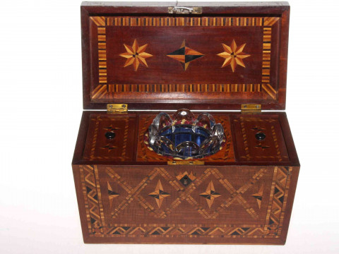 19th Century marquetry caddy, having profuse decoration enclosing two compartments and blending bowl, 27cm across. thumbnail