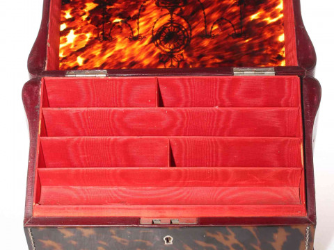 Good silver inlaid tortoiseshell stationery box, the sloping lid inlaid with garlands and revealing fitted interior, 29cm wide, 20cm high. thumbnail