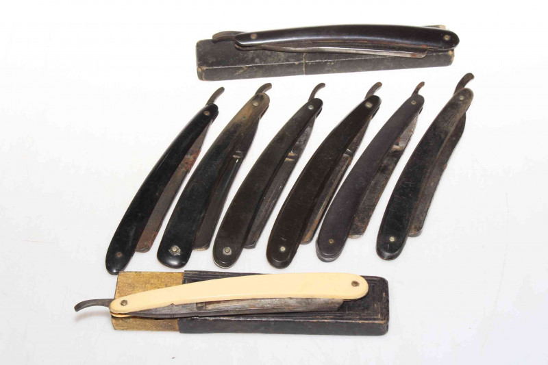 Collection of eight vintage razors.