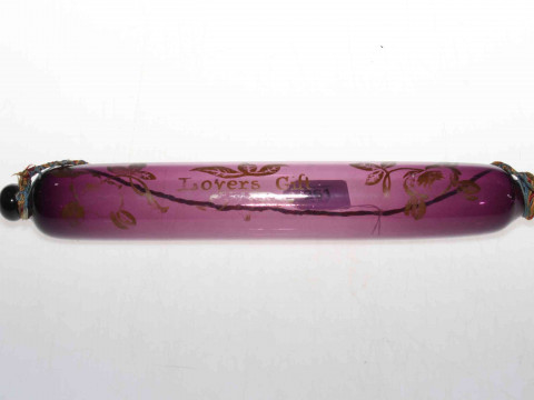 19th Century amethyst glass 'Lovers Gift' rolling pin, 37cm long.
