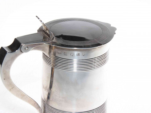 Good George III silver covered tankard, the body and lid with reeded decoration, good hallmarks to body and inside lid, makers mark SH (Hennell?), London 1799, 18cm high, 24.8toz. thumbnail