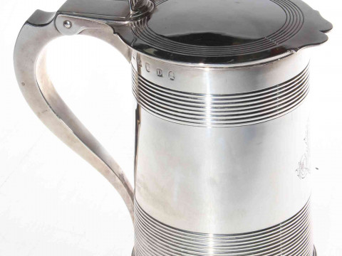 Good George III silver covered tankard, the body and lid with reeded decoration, good hallmarks to body and inside lid, makers mark SH (Hennell?), London 1799, 18cm high, 24.8toz. thumbnail