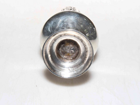 George III silver caster of baluster form, makers mark I.M, London 1776, good hallmarks to base and cover, 16cm. thumbnail