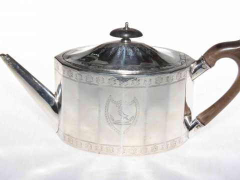 George III silver teapot by Foglebery & Gilbert, London 1756, having panelled...