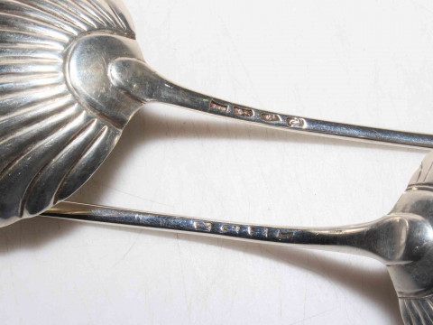 Matched pair of George III silver Old English pattern soup ladles with shell bowls, London 1774 and 1779, 32cm by 33cm lengths. thumbnail