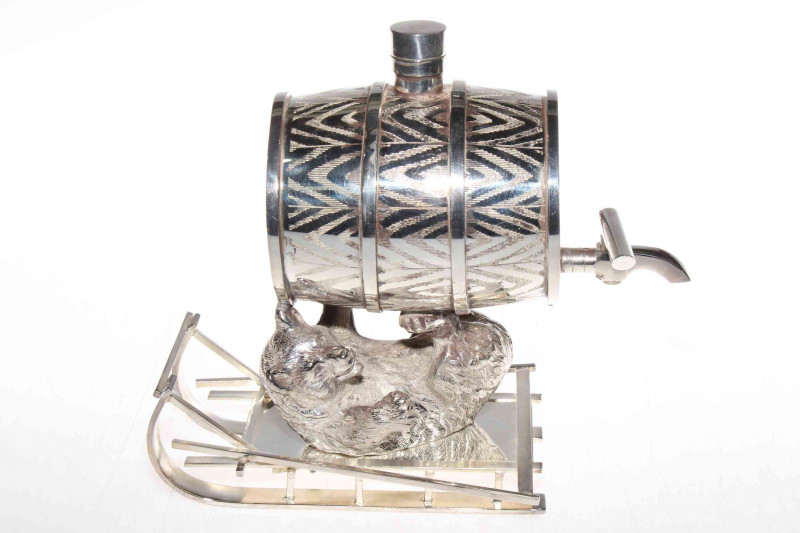 Silver plated novelty 'bear on sleigh' drink dispenser, 20cm high.