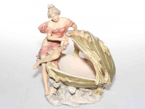 Good Royal Dux figure of maiden with flower garland seated with shell...