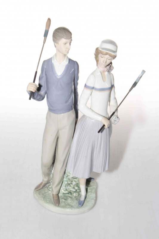 Lladro Golfing Couple, no. 1453, 34cm.