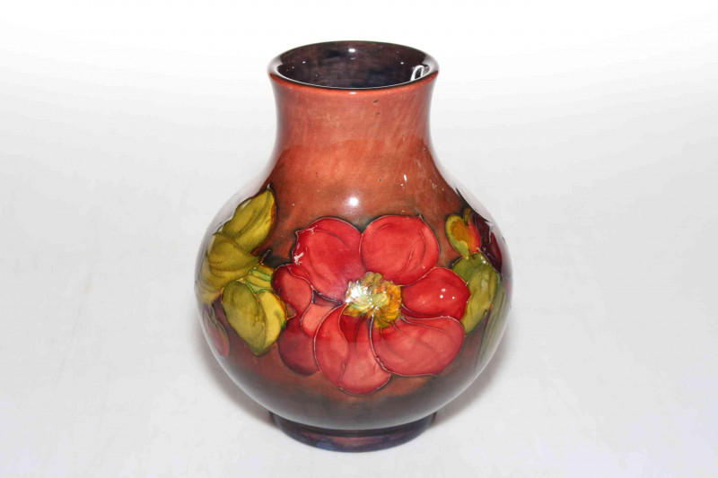 Moorcroft Clematis Flambé vase, impressed marks and signature, 19cm.
