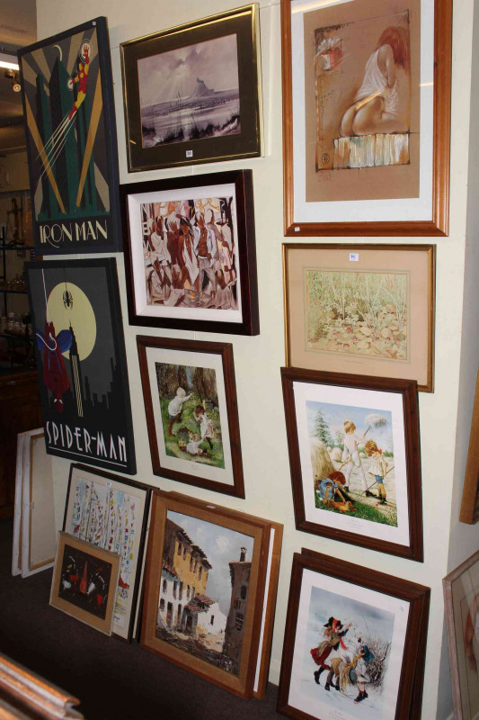 Collection of eighteen various paintings and prints including Continental oils, Super Heroes, etc.