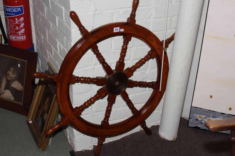Eight spoke ships wheel.