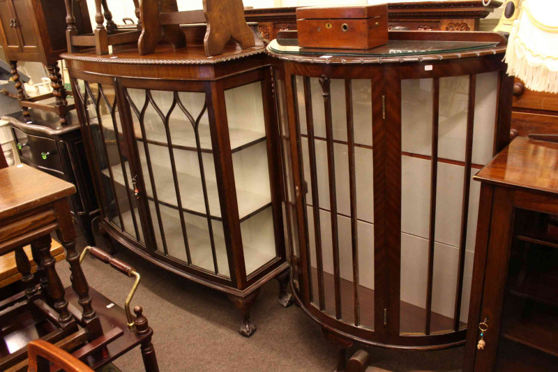 Two early 20th Century mahogany china cabinets.