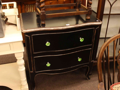 Black lacquered and silvered serpentine front two drawer chest, 82cm by...
