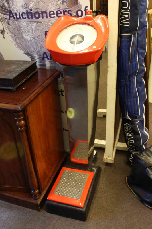 Coin operated personal scales.