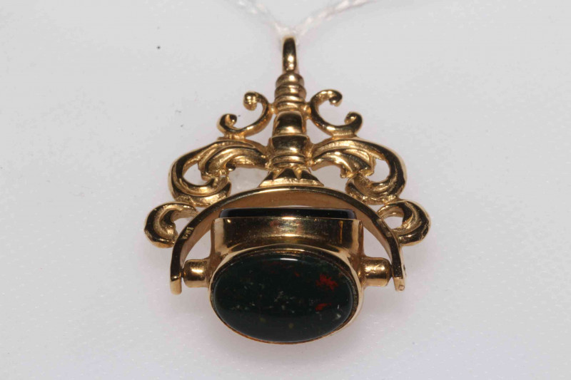 9 carat gold swivel hardstone fob.