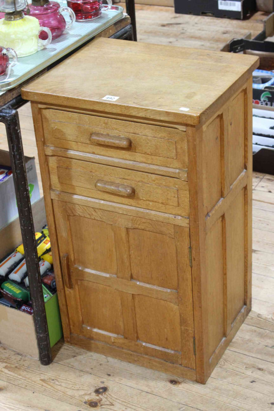 Panelled oak two drawer pedestal cupboard, 74cm x 44cm x 36cm.