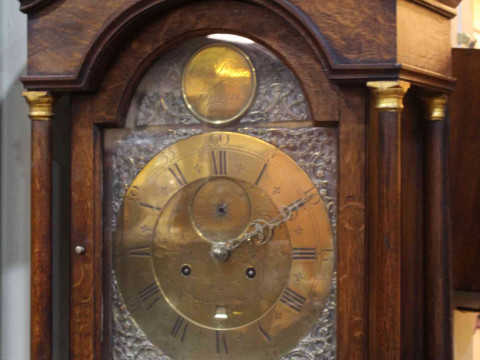 Antique oak 8-day longcase clock having arched brass dial, by Valen Downs, Louth. thumbnail