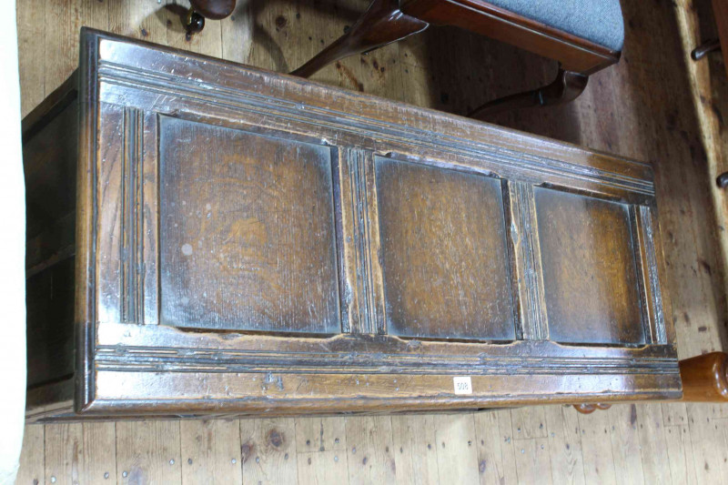 Carved oak triple panel front blanket box, 52cm x 106cm x 44cm.