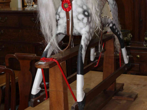 Collinson of Liverpool, dappled rocking horse on safety stand, 102cm x 122cm. thumbnail