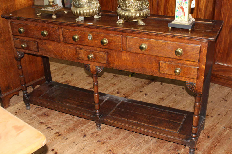 Period potboard dresser having three long drawers above three short drawers, on turned legs, 91.5cm x 167.5cm x 41cm.
