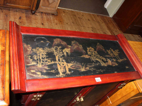 Oriental lacquered cabinet having two lacquered panel doors above two drawers, 93cm by 81.5cm by 38cm. thumbnail